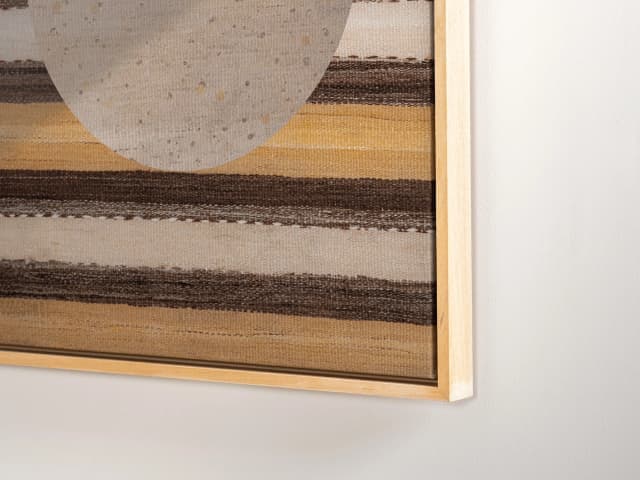 Eggercise canvas in yellow, brown and beige, shown in a lifestyle right view as image 1